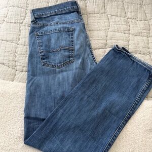 7 For All Mankind Light Blue Denim Jeans with Copper Button